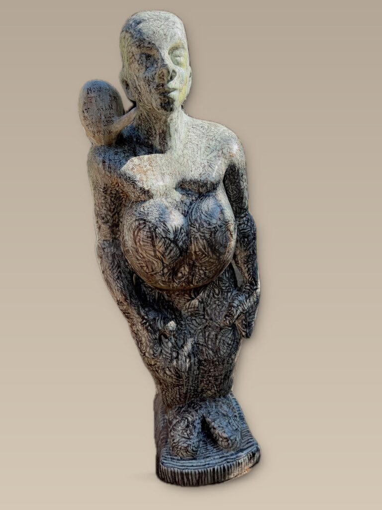 Dark figure carrying a child on her shoulder. Ceramic sculpture by Ted Fullwood